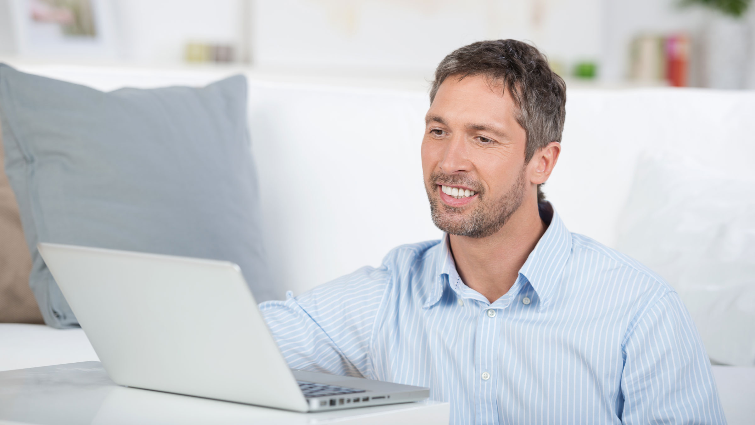 Man sitting in front of laptop